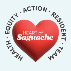 HEART of Saguache featuring a glossy red heart with "HEART of Saguache" in white on written on the inside, and framed with "Health", "Equity", "Action", "Resident", and "Team" circling the heart.